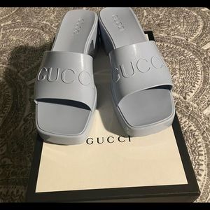 Gucci blue rubber slides